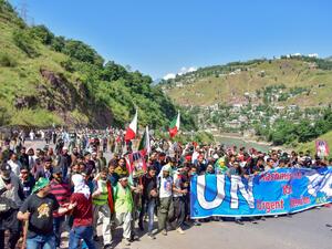 Kashmiri people march towards the border town of Chokathi to protest against the Indian government lockdown of Indian-controlled Kashmir, in Muzaffarabad on October 5, 2019. (AFP/ File Photo)