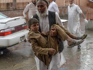 At least 28 worshippers were killed and dozens wounded by a blast inside an Afghan mosque during Friday prayers (AFP)