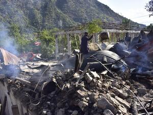 A Kashmiri resident removes wreckage of their damaged house after cross border shelling in Jura, a village of Neelum valley in Pakistan-administered Kashmir on October 21, 2019. (AFP/ File Photo)
