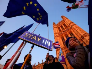 Banners, Union and EU flags are displayed outside the Houses of Parliament in London on October 22, 2019, as MPs debate the second reading of the Government's European Union (Withdrawal Agreement) Bill. (AFP/ File Photo)