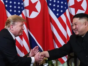 US President Donald Trump shakes hands with North Korean leader Kim Jong-un following a meeting in Hanoi, Vietnam, in February. (AFP/ File Photo)