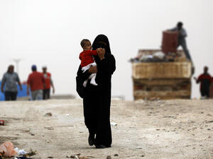 Displaced Syrians who fled the Islamic State's capital of Raqqa before it fell to Syrian forces are housed in Ain Issa, a camp north of the city. (Delil Souleiman/AFP via Getty Images)