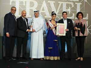 Zaeem Gama, CEO of Kanoo Travel receiving the Best Corporate Travel Company Award.