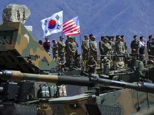 South Korean and US soldiers observe a live fire drill at the Seungjin Fire Training Field in Pocheon, 65 kms northeast of Seoul, in April 2017, before the joint exercises were postponed (AFP /JUNG Yeon-Je)