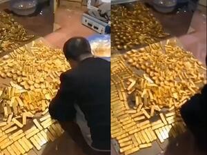 Thousands of golden bars and bricks were discovered by corruption inspectors at the man's home in Hainan Province, China, earlier this month. The official is being investigated. (Video Screenshot)
