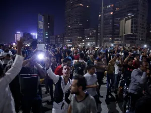 Egyptian protesters shout slogans as they take part in a protest in Cairo’s downtown on Friday calling for the removal of President Abdel Fattah Sisi. (AFP)