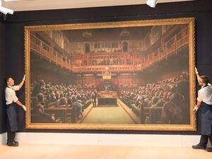 The $12.21 million winning bid was nearly 10 times the previous record for a Banksy artwork. (AFP)