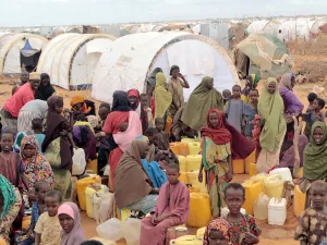Refugee camp, hundreds of thousands of difficult conditions, Somali immigrants are staying. African people waiting to get in the water. (Shutterstock/ File Photo)