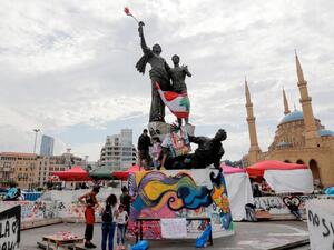 Muwatin Lebnene spontaneously emerged at the start of the protests to organize street clean-ups. (AFP)