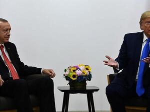 US President Donald Trump (R) and Turkish President Recep Tayyip Erdogan hold a bilateral meeting on the sidelines of the G20 Summit in Osaka on June 29, 2019. (Brendan Smialowski / AFP)
