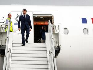 French President Emmanuel Macron disembarks from his plane after he landed at the Saint-Denis de la Reunion's airport on October 23, 2019 in the French overseas island of La Reunion as part of a four day trip in France's Indian Ocean overseas territories. Richard BOUHET / AFP