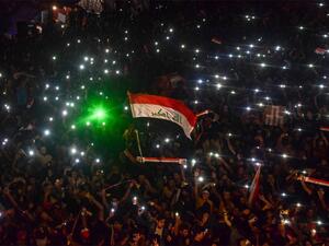 Iraqi protesters gather during a late anti-government demonstration in Nasiriyah, the capital of the southern province of Dhi Qar on November 4, 2019. AFP