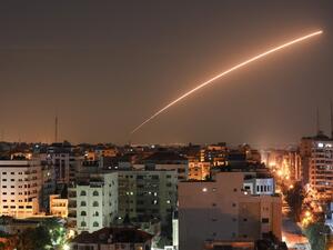 Israeli missile launched from the Iron Dome defence missile system, designed to intercept and destroy incoming short-range rockets and artillery shells, is seen above Gaza city on November 12, 2019. BASHAR TALEB / AFP