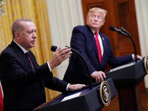 US President Donald Trump and Turkey's President Recep Tayyip Erdogan (L) take part in a joint press conference in the East Room of the White House in Washington, DC on November 13, 2019. President Donald Trump greeted his Turkish counterpart Recep Tayyip Erdogan at the White House for a high-stakes meeting Wednesday that underlined his claim to be ignoring the impeachment drama unfolding simultaneously in Congress. MANDEL NGAN / AFP