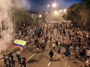 University students clash with members of the Mobile Anti-Disturbance Squadron (ESMAD), during a nationwide strike called by students, unions and indigenous groups to protest against the government of Colombia's President Ivan Duque in Medellin, Colombia, on November 21, 2019. JOAQUIN SARMIENTO / AFP