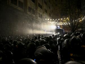 Riot police use a water cannon against protesters demanding the government's resignation and early parliamentary polls outside the parliament in Tbilisi on November 26, 2019. Zurab Tsertsvadze / AFP