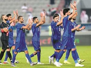 Kuwait players celebrate their win over Saudi Arabia in their Arabian Gulf Cup match at Abdullah Bin Khalifa Stadium yesterday. Photo: Anas Khalid