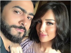 الفنان تامر حسني وزوجته بسمة بوسيل