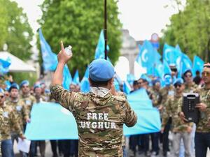 Ethnic Uyghurs take part in a protest march asking for the European Union to call upon China to respect human rights in the Chinese Xinjiang region and asking for the closure of "re-education centers." (AFP/ File Photo)
