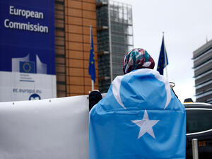Activists protest the treatment of Uyghur Muslims by Chinese authorities in Xinjiang province at a protest outside the headquarters of the European Union. (Shutterstock/ File Photo)