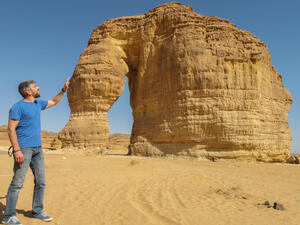 A man "stroked" the rock formation known as the Elephant Rock in Al Ula, Saudi Arabia. (Shutterstock/ File Photo)