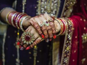 Chintaharan Chauhan who wears a red sari, huge nose ring, bangles and jhumkas everyday (Twitter)