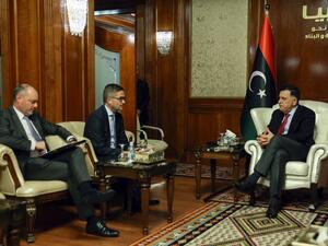 Libya's UN-recognised Prime Minister Fayez al-Sarraj (R) meets with the European Union's ambassador to Tripoli Alan Bugeja (L) and Germany's ambassador Oliver Owcza in the Libyan capital on December 5, 2019. (AFP/ File Photo)