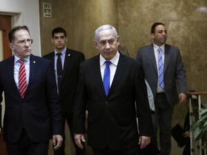 Israeli Prime Minister Benjamin Netanyahu (C) arrives at the weekly cabinet meeting in Jerusalem December 8, 2019. (AFP/ File Photo)