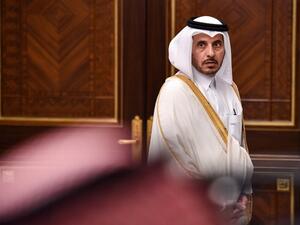 Abdullah bin Nasser bin Khalifa al-Thani, Qatar's Prime Minister, is seen waiting for a family picture during the 40th Gulf Cooperation Council (GCC) summit held at the Saudi capital Riyadh on December 10, 2019. Fayez Nureldine / AFP