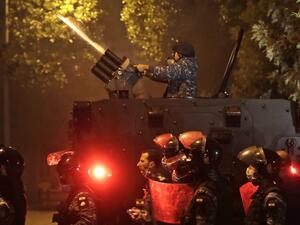 Lebanese riot police clash with supporters of Lebanon's Shiite Hezbollah and Amal groups as they were heading to the area where anti-government protests were taking place early on December 12, 2019 in central Beirut. ANWAR AMRO / AFP