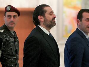 Lebanese caretaker Prime Minister Saad Hariri walks at the presidential palace in Baabda, east of Beirut, on December 19, 2019. AFP