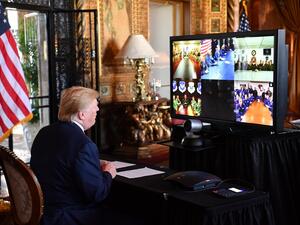 US President Donald Trump makes a video call to the troops stationed worldwide at the Mar-a-Lago estate in Palm Beach Florida, on December 24, 2019. Nicholas Kamm / AFP