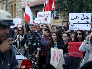 Lebanese women shout slogans during a march in Beirut on 07 December, 2019. The NGO Abaad joined forces with different feminist groups to help break the silence around crimes of harassment and sexual assault. PATRICK BAZ / ABAAD / AFP-Services
