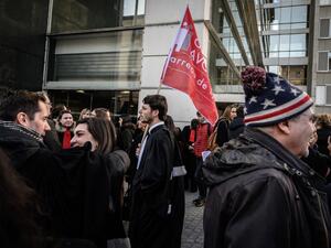 Lawyers take part in a demonstration against the French government's plan to overhaul the country's retirement system, on January 6, 2020 in Lyon, central eastern France. JEAN-PHILIPPE KSIAZEK / AFP