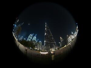 A picture taken with a fisheye lens shows Dubai's Burj Khalifa, the world’s tallest building, ahead of celebrations marking ten years since its construction, on January 4, 2020. Giuseppe CACACE / AFP