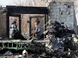 Rescue teams work at the scene after a Ukrainian plane carrying 176 passengers crashed near Imam Khomeini airport in the Iranian capital Tehran early in the morning on January 8, 2020, killing everyone on board. All 176 people on board a Ukrainian passenger plane were killed when it crashed shortly after taking off from Tehran on January 8, Iranian state media reported. State news agency IRNA said 167 passengers and nine crew members were on board the aircraft operated by Ukraine International Airlines. AFP
