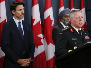 Canadian Prime Minister Justin Trudeau (L), Minister of National Denfence Harjit Sajjan (C) listen as Chief of Defence Staff General Jonathan Vance addresses the media during a news conference January 8, 2020 in Ottawa, Canada. Dave Chan / AFP