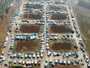 A drone picture taken on January 11, 2020, shows a camp for the displaced on the outskirts of the town of Binnish in Syria’s northwestern province of Idlib. Resident's of Syria's last major opposition bastion welcomed a UN vote renewing cross-border aid to the country, as relief groups condemned restrictions to the programme which is helping millions. The United Nations Security Council on Friday voted to extend humanitarian aid to Syria, including to some of the most needy in the northwestern region of Idl