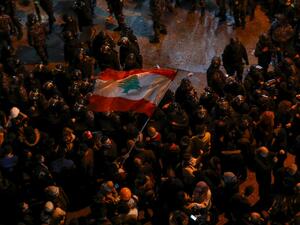 Lebanese anti-government protesters gather at the entrance of a police barracks housing the detainees who were arrested overnight, in the capital Beirut on January 15, 2020. (AFP/ File Photo)