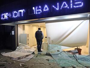 A man stands at the entrance of bank that was vandalised by anti-government protesters in the capital Beirut overnight on January 16, 2020. (AFP/ File Photo)