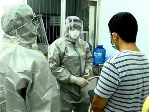 Two Chinese nationals in Vietnam have tested positive for the SARS-like coronavirus and are being treated in hospital, officials said on January 23. STR / Vietnam News Agency / AFP
