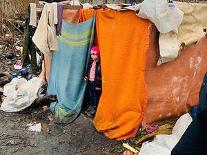 The rubbish tip where the girl was living. Valentina Kartasheva, who works at the orphanage said: 'We did not want to give her to him, we had a feeling. But we had to obey the law'. (CEN)