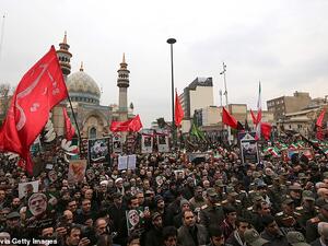 Thousands pack the streets in front of Imam Jafar Sadegh Mosque in downtown Tehran on Saturday afternoon many flying the red flag. (AFP/ File Photo)