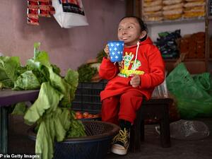 Khagendra Thapa Magar (pictured), 27, who measured 2ft 2.41ins, died on Friday at a hospital in Nepal, his family said. He was the world's shortest man who could walk (AFP/ File Photo)