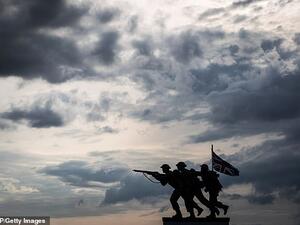 The new British memorial to the World War Two (WWII) Normandy landings by sculptor David Williams-Ellis, is silhouetted along Gold beach at Ver-sur-Mer. (AFP/ File Photo)