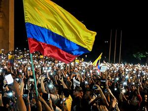 People take part in a protest against the government of Colombia's President Ivan Duque, in Cali, Colombia [Luis Yobayo/AFP] 