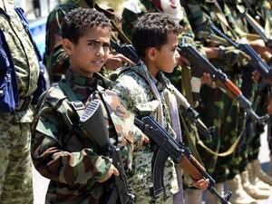 Top Houthi officials heap praise on young soldiers who have died in a conflict they describe as a sacred war against America, Israel and other outside powers (AFP)