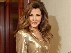 Nancy has raised the victory sign in a previous picture (source: @nancyajram Instagram)
