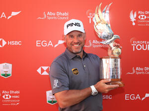 Westwood celebrates with the Falcon trophy