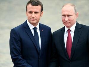 French President Emmanuel Macron meets with his Russian counterpart Vladimir Putin at Versailles, France, on May 29, 2017. (AFP)